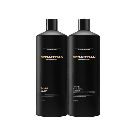 Two black Sebastian Professional Dark Oil shampoo and conditioner bottles standing side by side on a plain white background.