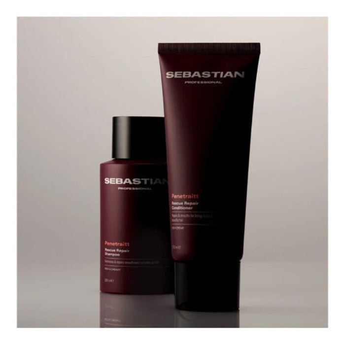 Sebastian haircare set featuring a dark burgundy shampoo bottle and a matching conditioner tube with black caps, displayed on a neutral light gray background.