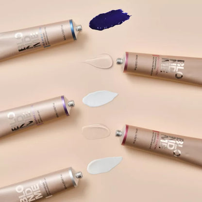 Multiple tubes of BB cream on a beige background with visible product swatches.