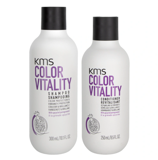 Two KMS Color Vitality shampoo and conditioner bottles on a white background