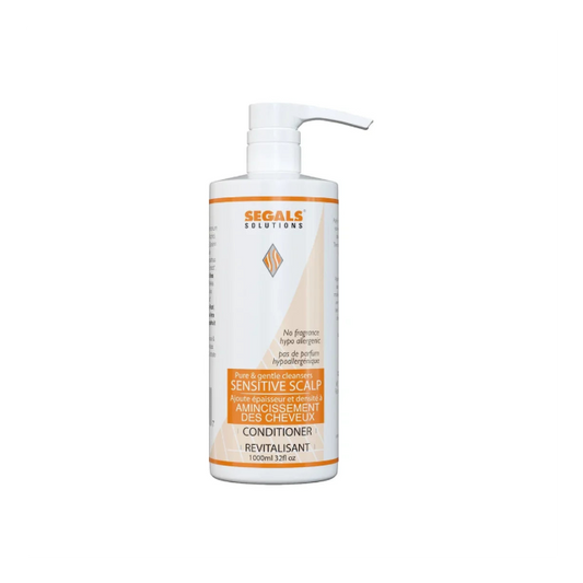A white pump bottle of Segals Solutions Sensitive Scalp Conditioner with orange and beige accents on the label, set against a plain white background.