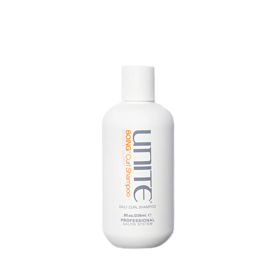 Unite Curl Shampoo bottle on a white background