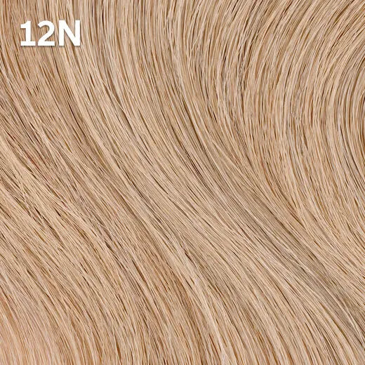 Close-up of blonde hair extensions with color code Wella Color Charm  '12N'.