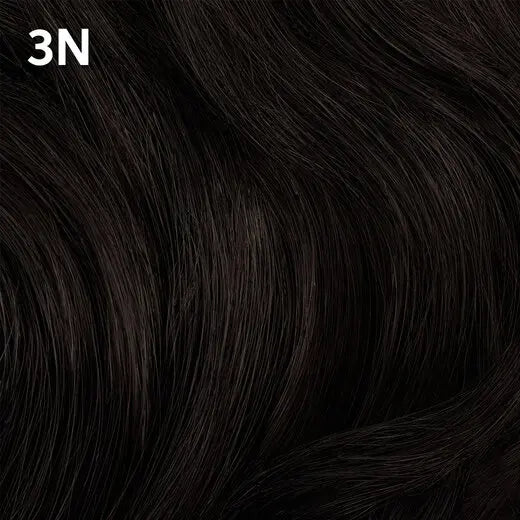 Close-up of dark hair with a focus on color  Wella Color Charm 3N.
