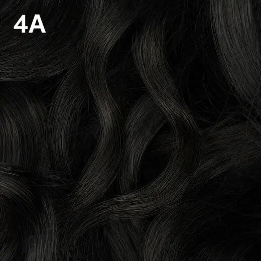 Wella Color Charm Permanent Liquid Color close-up of black hair with '4A' label