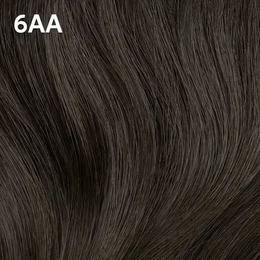 Wella Color Charm Permanent Liquid Color close-up of dark brown hair extensions with '6AA' label.