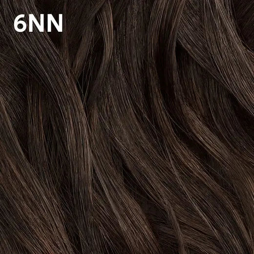 Close-up of  Wella Color Charm dark brown hair with '6NN' label