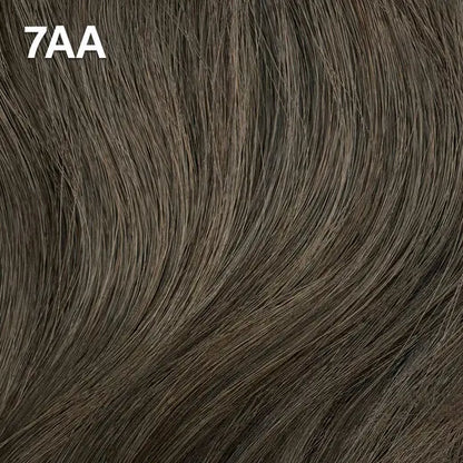 Wella Color Charm Permanent Liquid Color close-up of brown hair extensions with '7AA' label