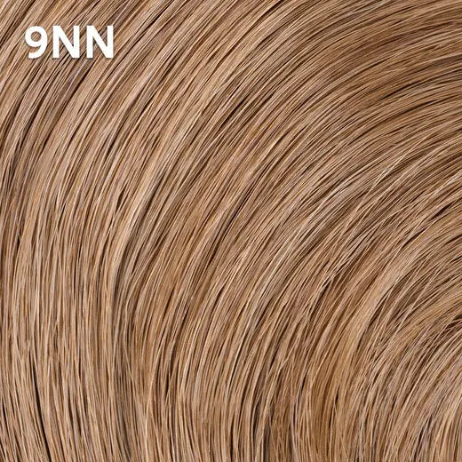 Close-up of blonde hair extensions with     Wella Color Charm '9NN' label