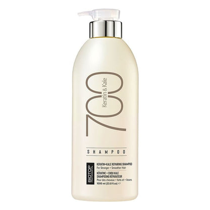 A bottle of Keratin-Kile 700 Shampoo by Redhead, featuring a cream-colored bottle with a silver pump and dispenser cap, set against a plain white background.