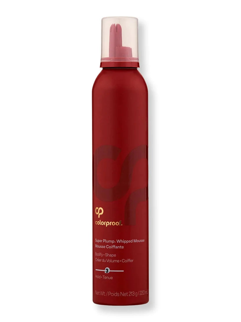 Red mousse bottle with white cap on a white background