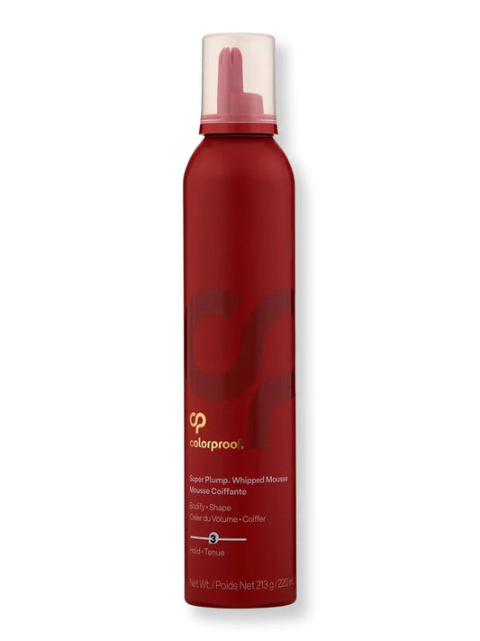 Red mousse bottle with white cap on a white background