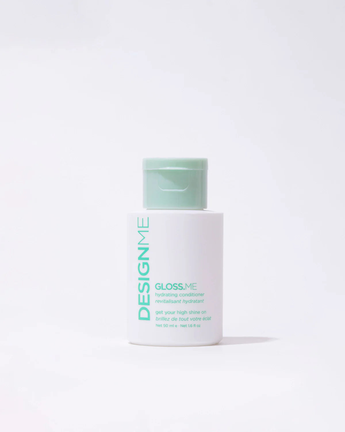 Design.me gloss.me conditioner travel light gray background