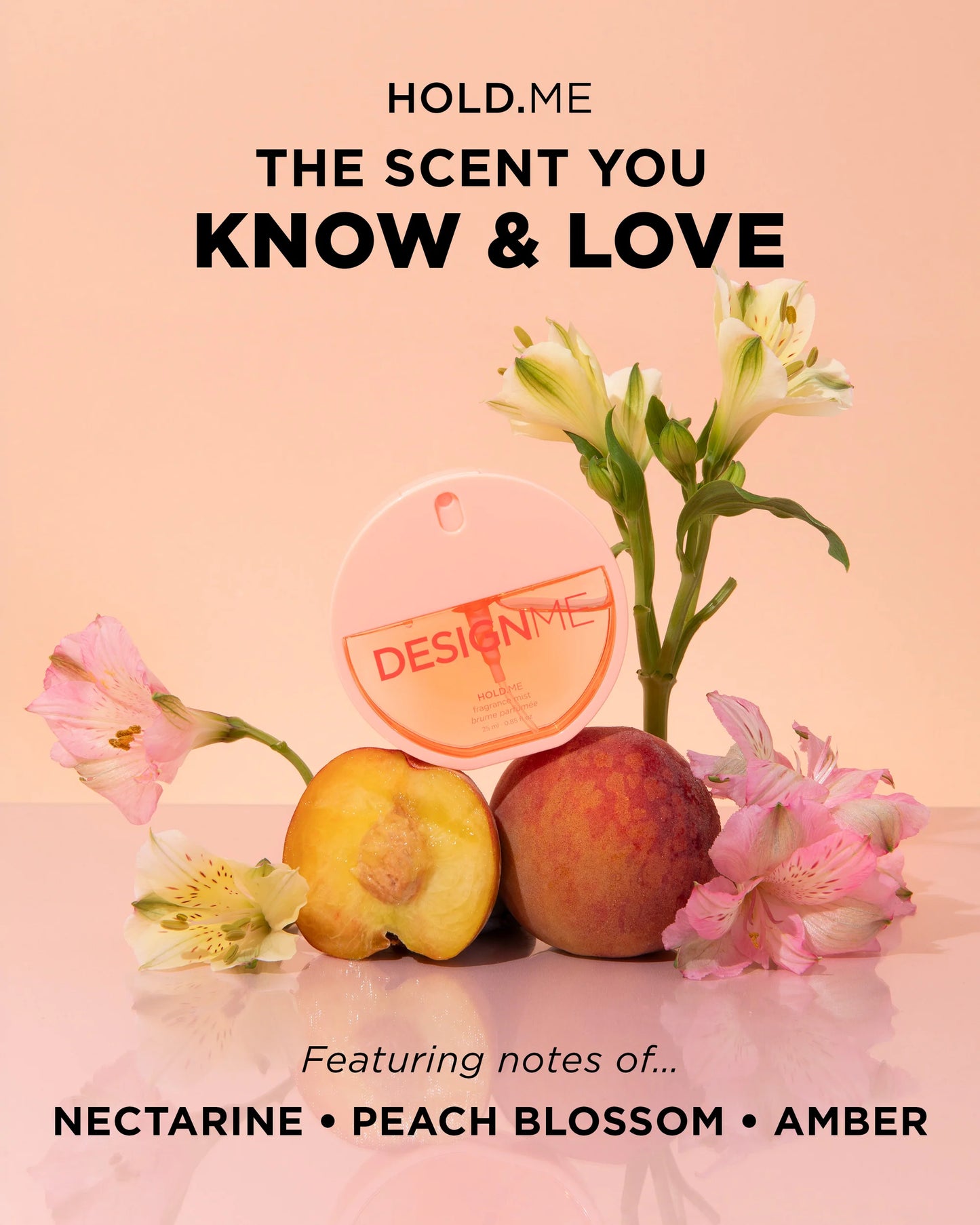 A perfume bottle labeled DESIGN ME is arranged with peach blossoms and two peaches on a soft peach background, alongside text reading 'HOLD,ME THE SCENT YOU KNOW & LOVE' and 'Featuring notes of.