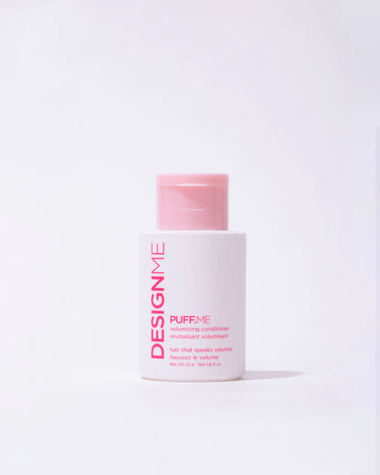 'DesignMe' puff-me conditioner travel with pink cap on a white background