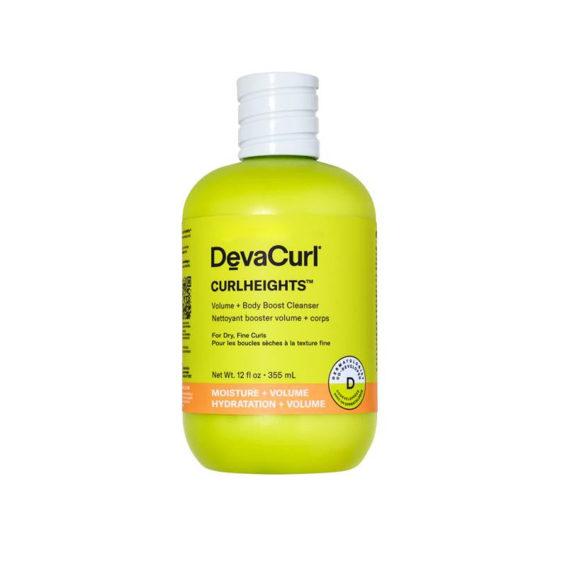 A bottle of DevaCurl Curlheights Volume + Body Boost Cleanser in a bright yellow-green translucent plastic bottle with a white ribbed cap, shown on a plain white background.