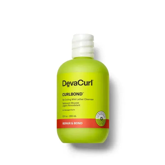 Green bottle of DevaCurl CurlBond cleanser on a white background