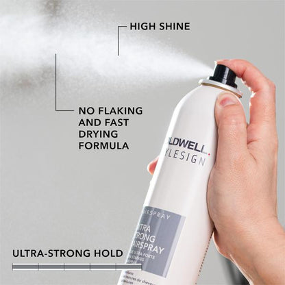 Hand holding a Wildwell hair spray bottle with product features highlighted on a gray background
