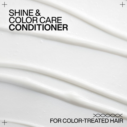 Shine and color care conditioner for color-treated hair with white hair strands background