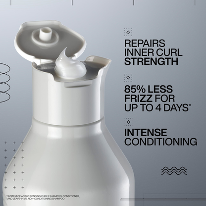 White bottle of hair care product with text on a gray background