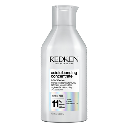 Redken acidic bonding concentrate conditioner bottle on a white background