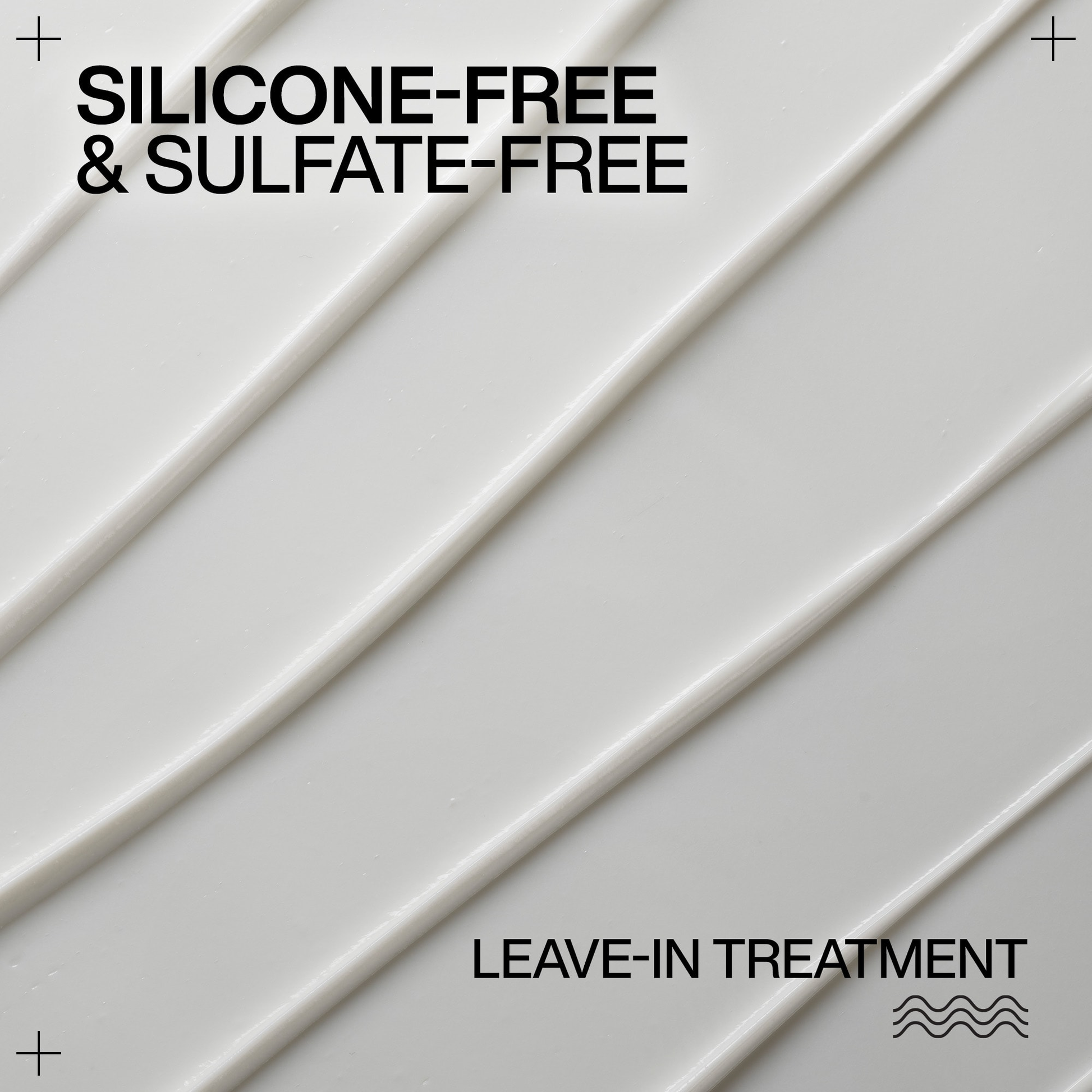 Silicone-free and sulfate-free leave-in treatment with white lines on a light gray background