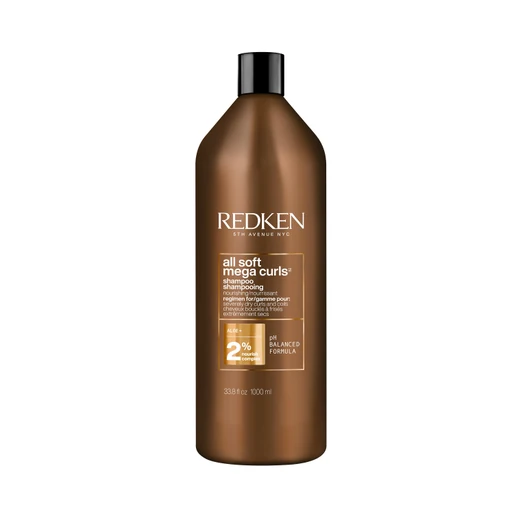 Redken shampoo bottle on a white background