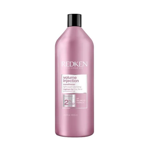 Redken Volume Injection conditioner bottle on a white background
