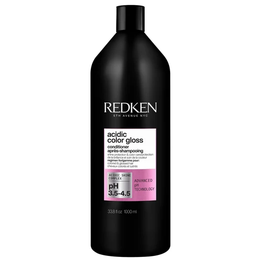 Black bottle of Redken Acidic Color Gloss conditioner on a white background
