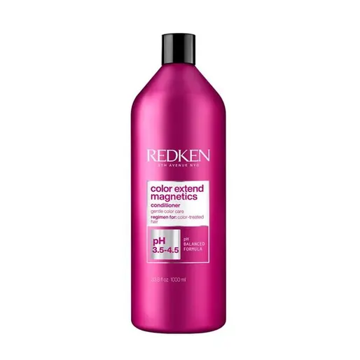 Redken hair care product on a white background