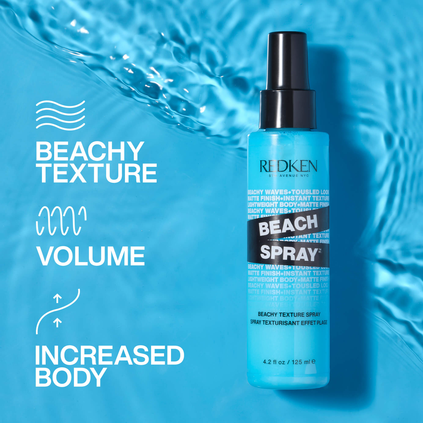 Redken Beach Spray bottle on a blue water background with product features listed.