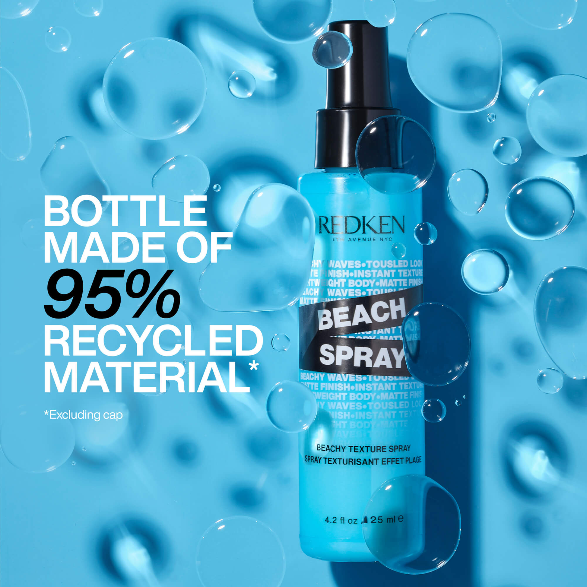 Redken Beach Spray bottle with recycled material text on a blue background