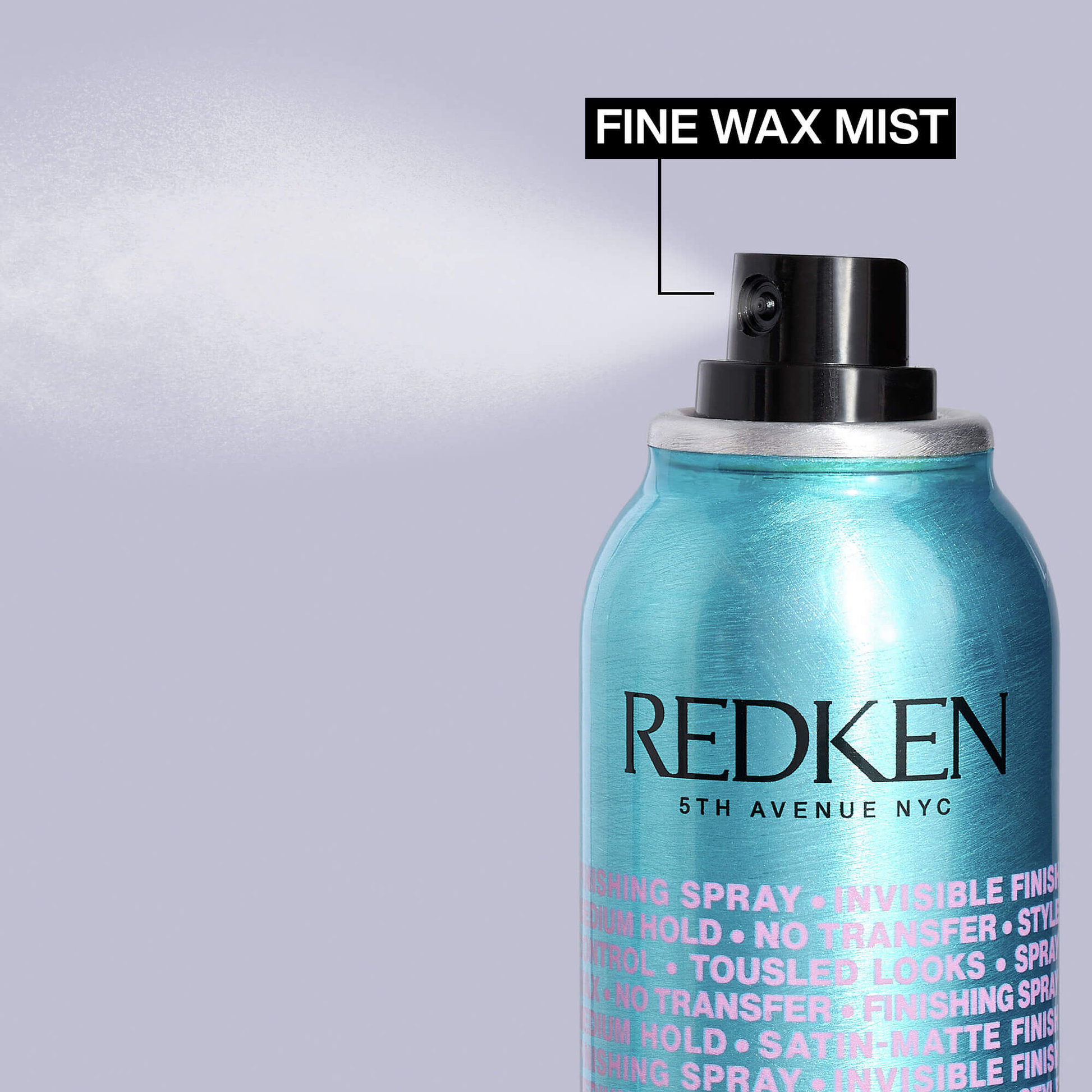 Redken spray bottle with 'Fine Wax Mist' label on a light gray background