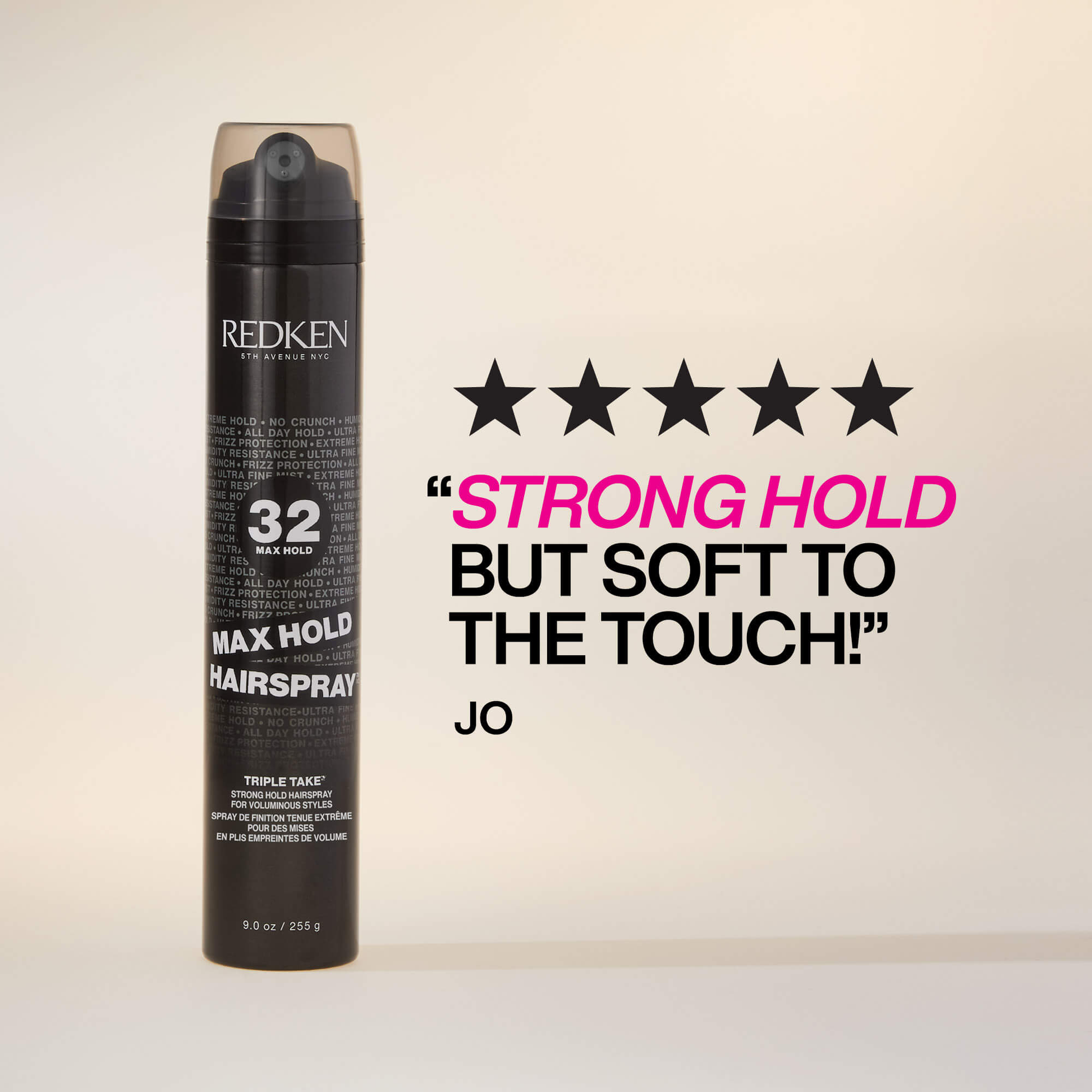Redken hairspray bottle with text on a beige background