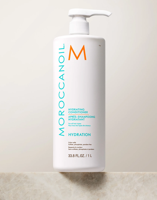 Moroccanoil hair care product bottle on a light background