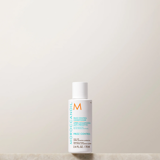 Moroccanoil hair care product bottle on a light background