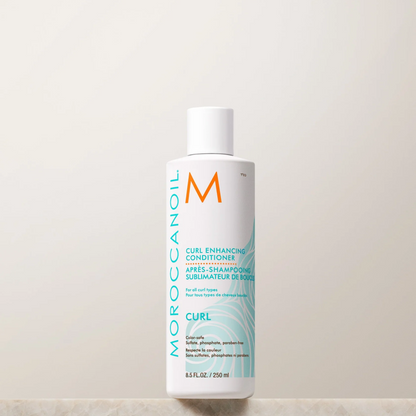Moroccanoil Curl Enhance Conditioner bottle on a light background