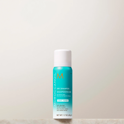 Moroccanoil shampoo bottle on a light background