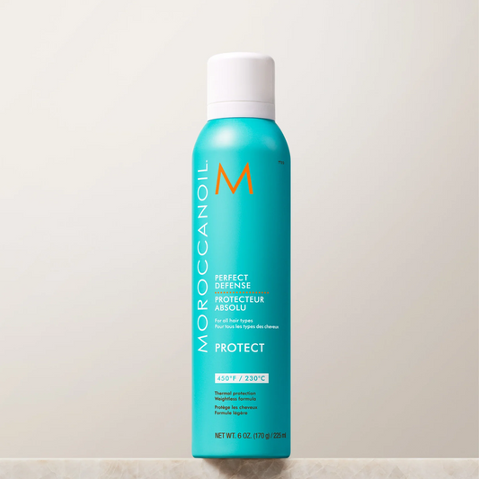 Moroccanoil hair care product bottle on a light background