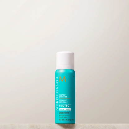 Moroccanoil bottle on a light beige background