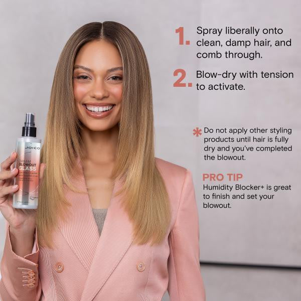 Woman holding a hair product with instructions on a gray background