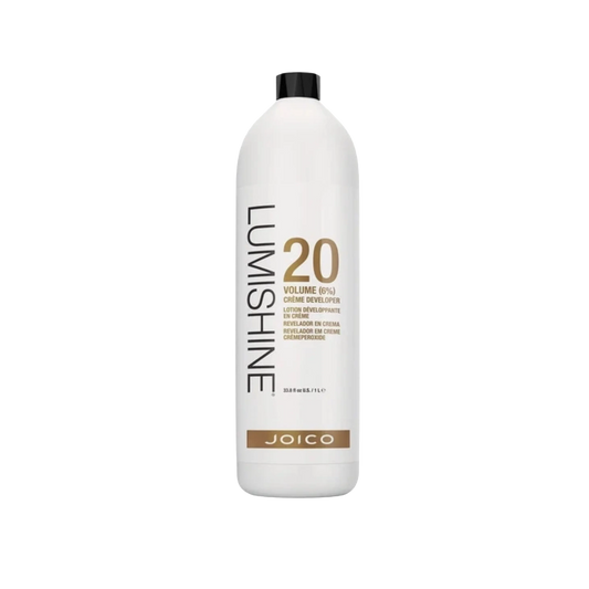 A large white bottle of Joico Lumshine Volume 20 Creme Developer with a black cap, shown on a plain white background.