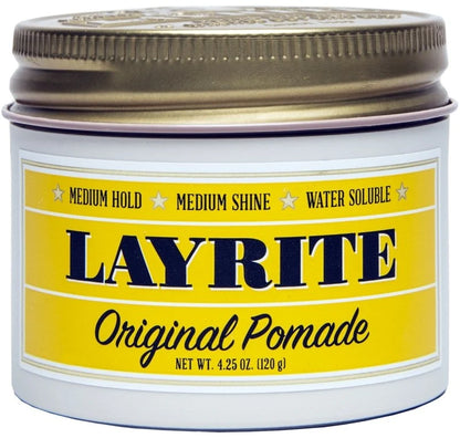 A white plastic jar of Layrite Original Pomade with a metallic gold screw-on lid and a yellow label featuring navy blue text.