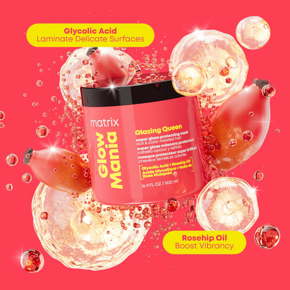 Matrix Glow Mania Glazing Queen hair mask bottle surrounded by rosehip oil droplets and pomegranate graphics on a bright pink background.