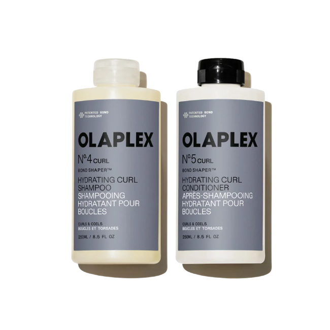 Two Olaplex bottles, one for shampoo and one for conditioner, on a white background.