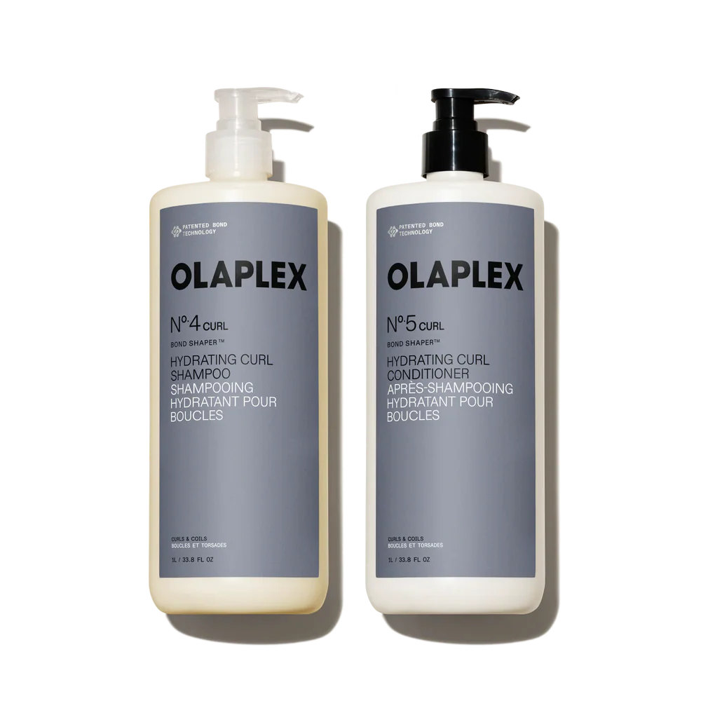 Olaplex shampoo and conditioner bottles on a white background