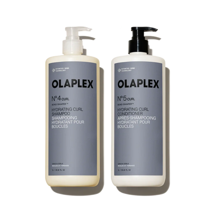 Olaplex shampoo and conditioner bottles on a white background