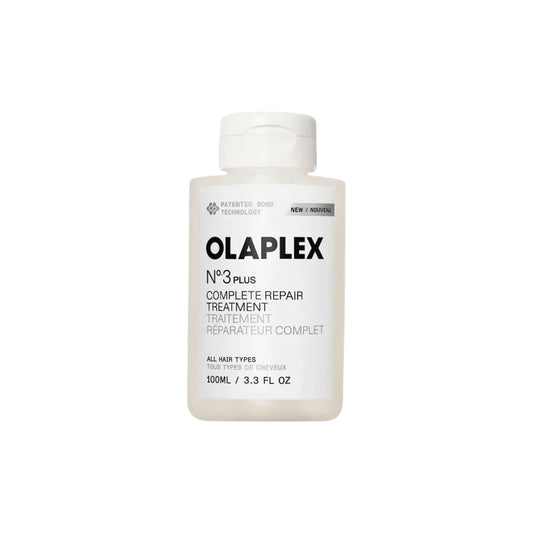 A white plastic bottle of Olaplex N°3 Plus Complete Repair Treatment with black text on a clean white background.