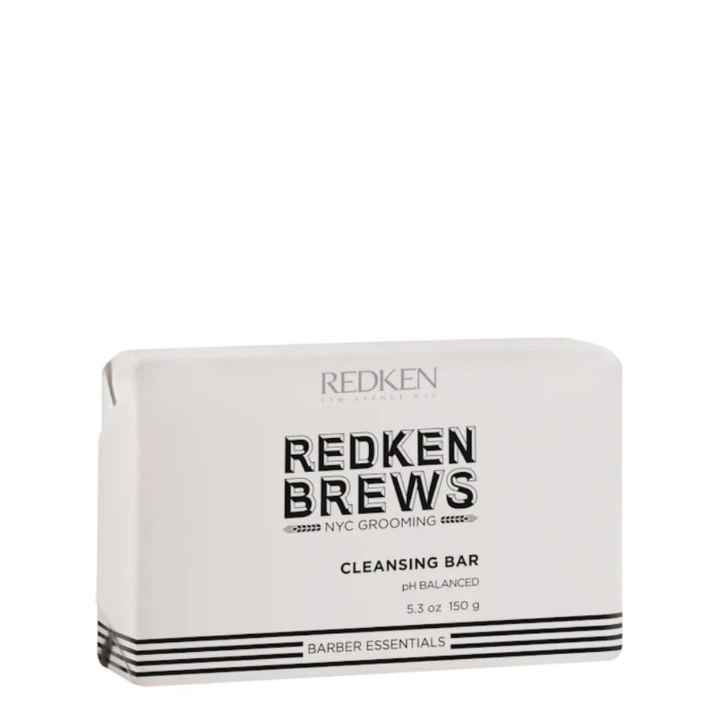 Redken Redken Brews Cleansing Bar in a white rectangular box with black text and stripes, on a plain white background.