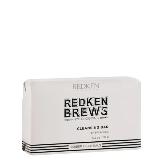 Redken Redken Brews Cleansing Bar in a white rectangular box with black text and stripes, on a plain white background.